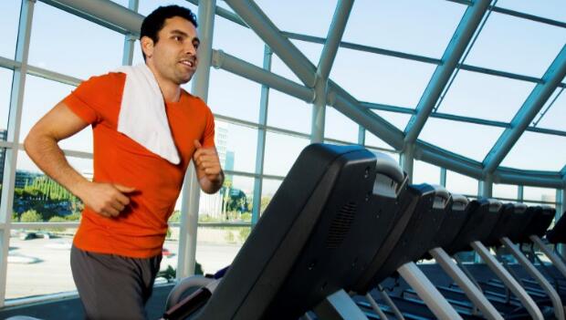 Man Exercising On Treadmill-Carousel
